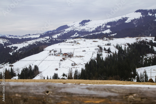 Winter landscape in the Carpathian mountains  with gutsul culture. photo