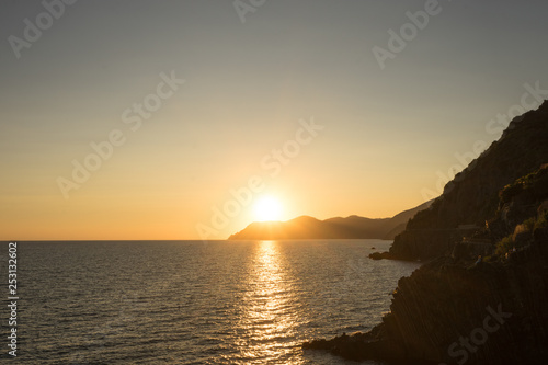 Golden sunset at the cliff at the Italian Riviera in the Village of Riomaggiore  Cinque Terre  Italy