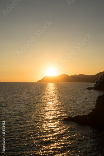 Golden sunset at the cliff at the Italian Riviera in the Village of Riomaggiore  Cinque Terre  Italy