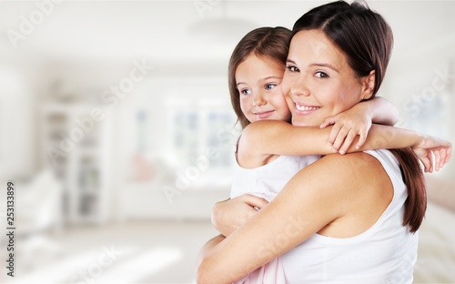 Happy Mother and daughter hugging
