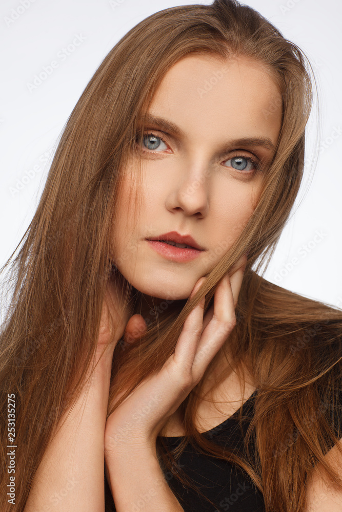 Portrait of a beautiful model with strong emotion, dressed in a black dress Portrait of a beautiful model with strong emotion, dressed in a black dress