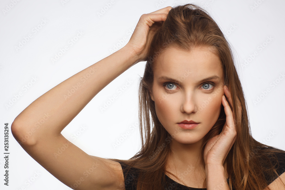 Portrait of a beautiful model with strong emotion, dressed in a black dress Portrait of a beautiful model with strong emotion, dressed in a black dress