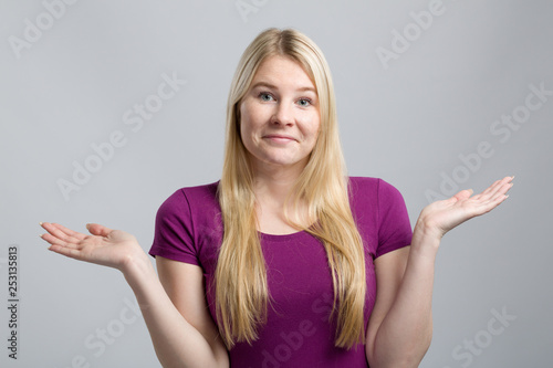 Wallpaper Mural young woman shows that she doesn't know Torontodigital.ca