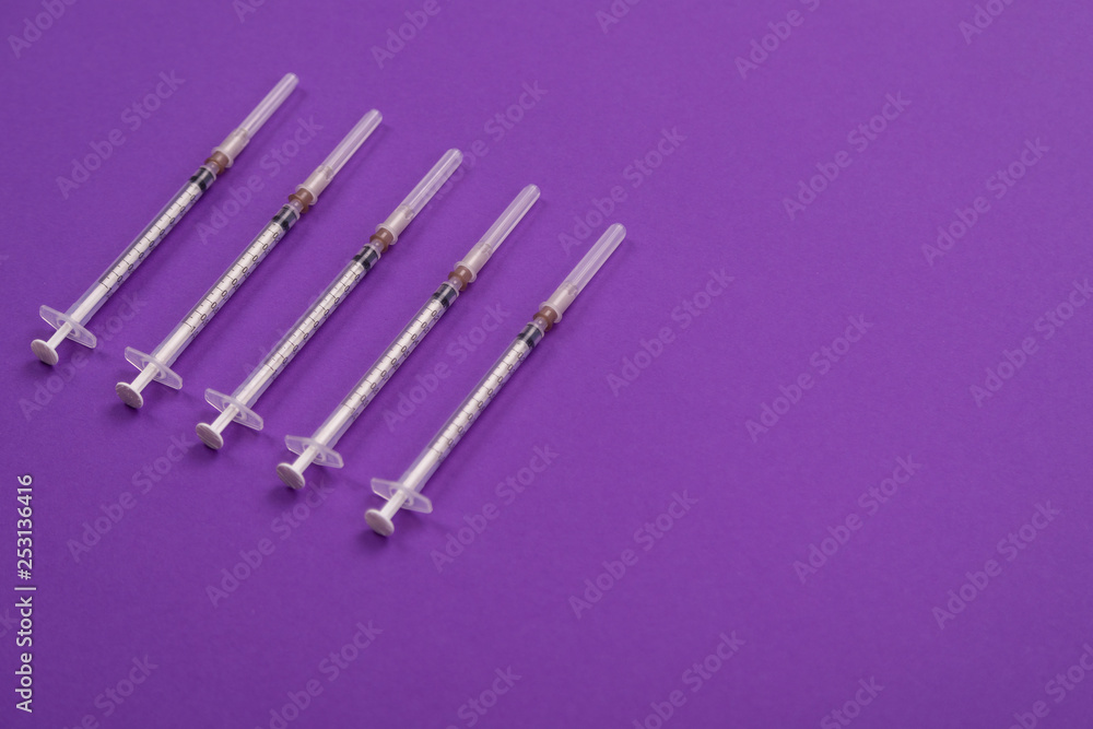 1-ml syringes isolated on a bright background 1-ml syringes isolated on a bright background