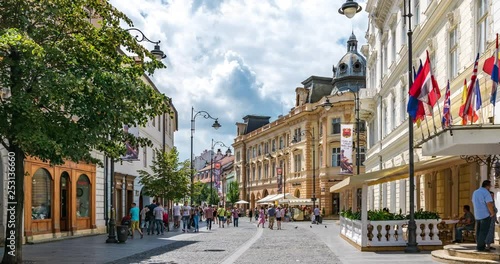 4k Timelapse (zoom out) of people walking on the Nicolae Balcescu in Sibiu, Romania