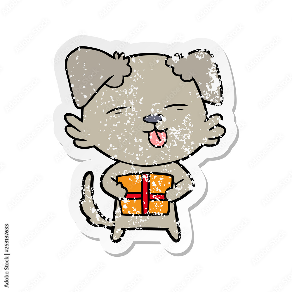distressed sticker of a cartoon dog with christmas present distressed sticker of a cartoon dog with christmas present