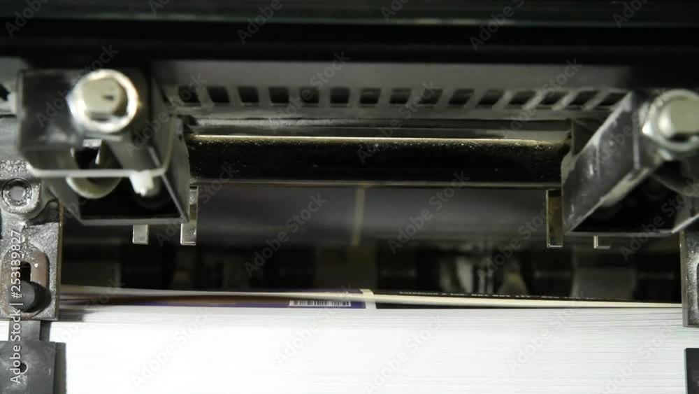 Paper Sheets Are Loading In Offset Printing Press Machine. Print industry Paper Sheets Are Loading In Offset Printing Press Machine. Print industry