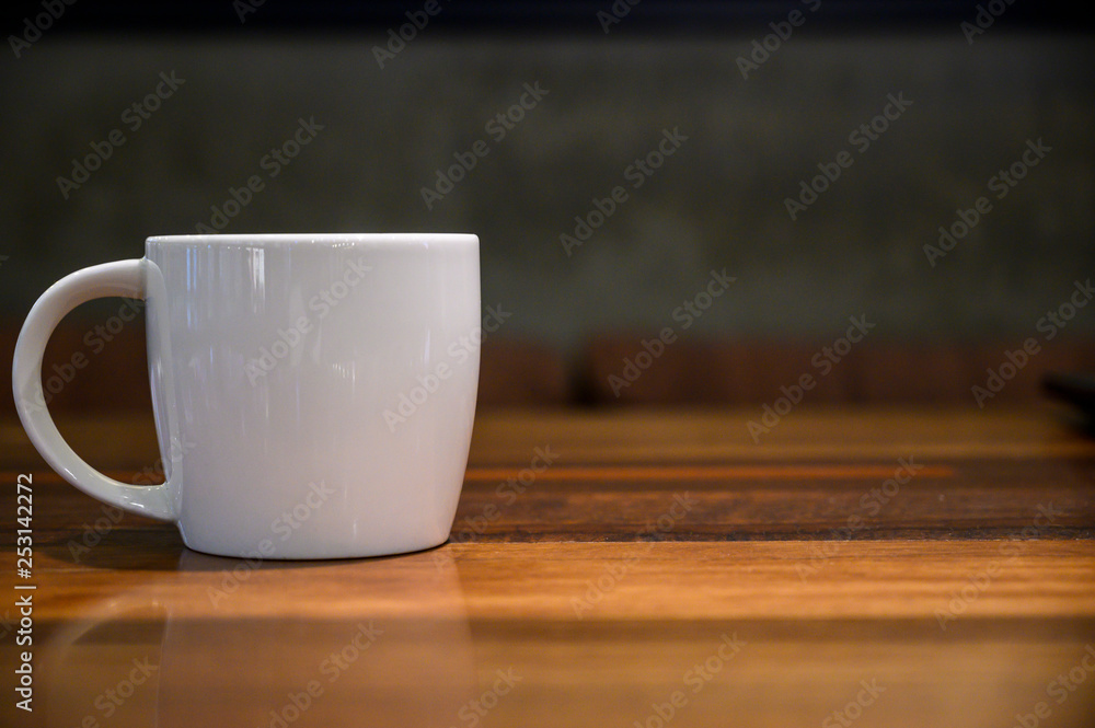 coffee cup on the wood table close up coffee cup on the wood table close up