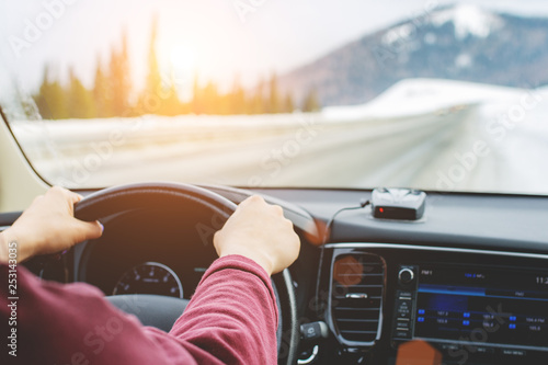 woman driving her car on the mountain country road photo