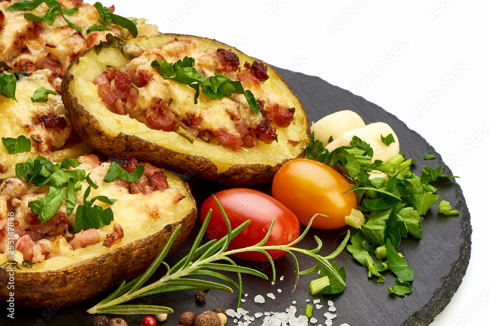 Baked potatoes stuffed with cheese and bacon, Homemade food, close-up, isolated on white background Baked potatoes stuffed with cheese and bacon, Homemade food, close-up, isolated on white background