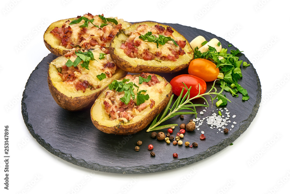 Hot Baked stuffed Potatoes with cheese, bacon, parsley, close-up, isolated on white background