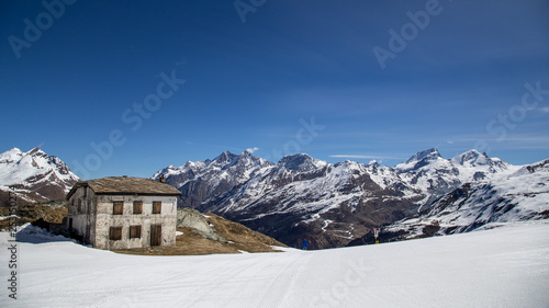 Stone Hut in the snowy Swiss Moutains