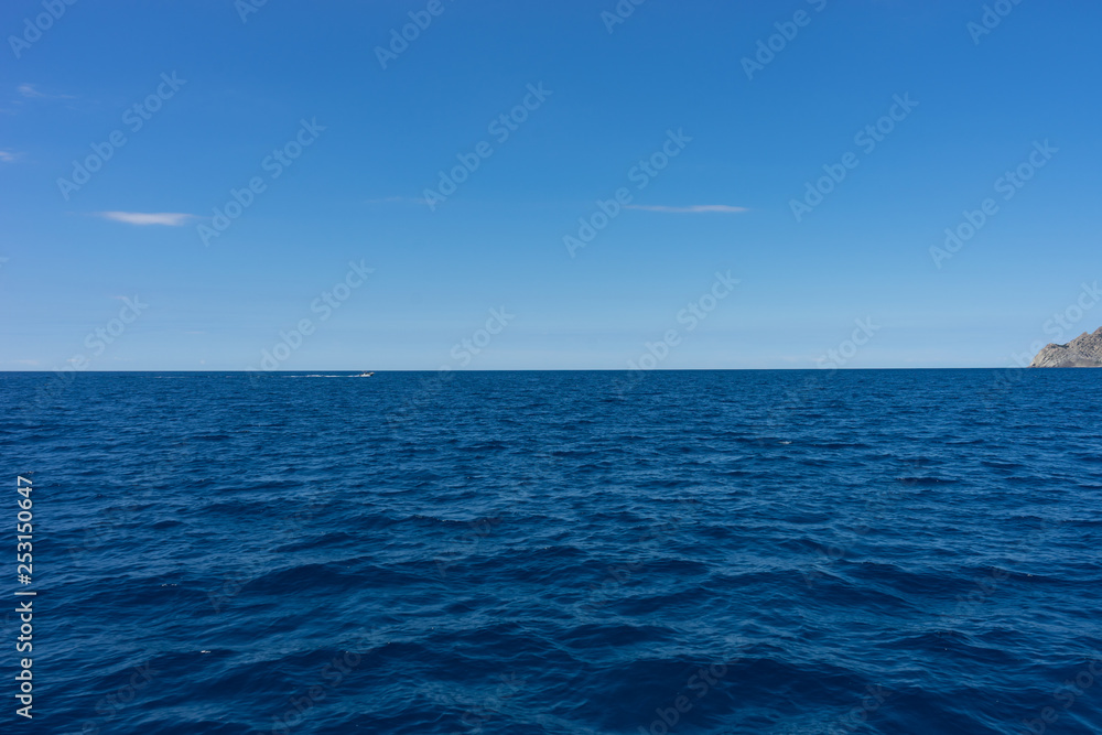 Italy,Cinque Terre,Riomaggiore, a large body of water next to the ocean Italy,Cinque Terre,Riomaggiore, a large body of water next to the ocean