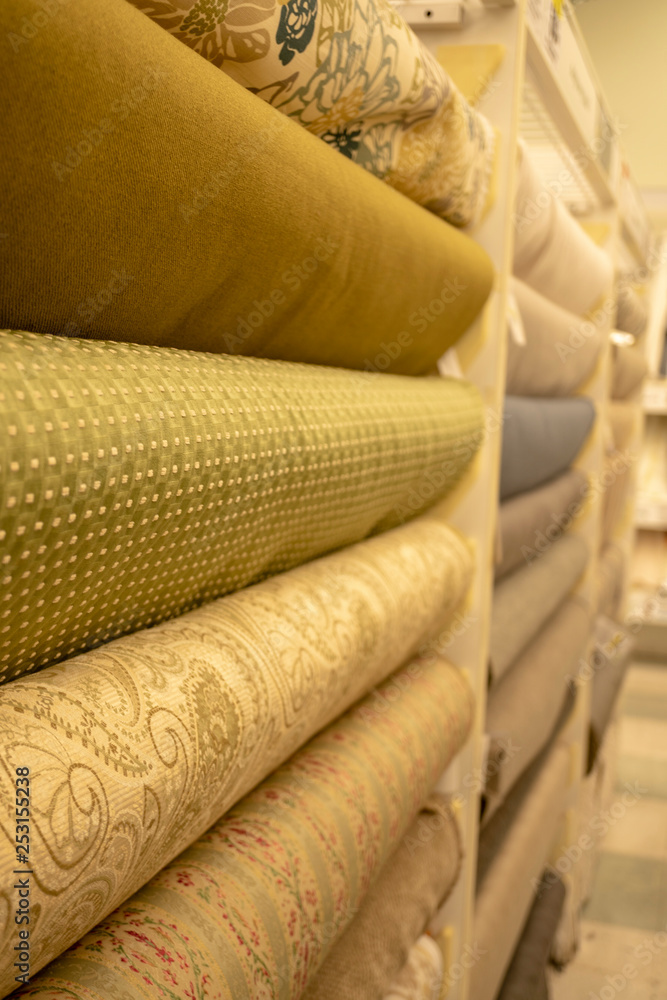 rolls of colorful fabrics rolls of colorful fabrics