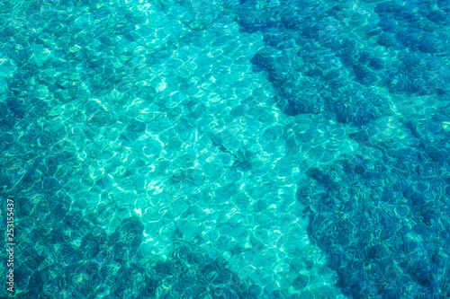 Crystal clear water in the port of Fiskardo, look from above