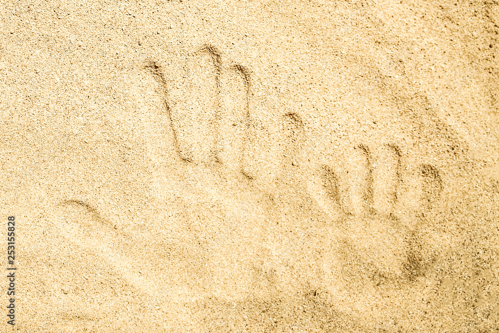 Beautiful drawing on the sand of the sea background Beautiful drawing on the sand of the sea background