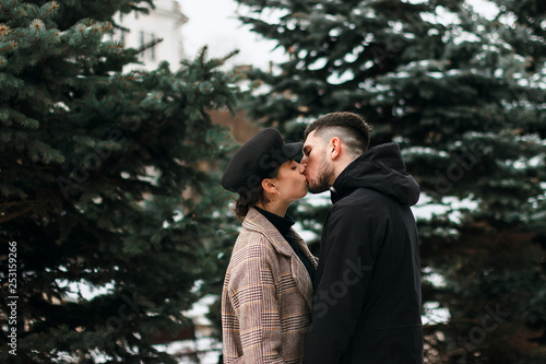 Romantic young couple is having fun outdoors in winter