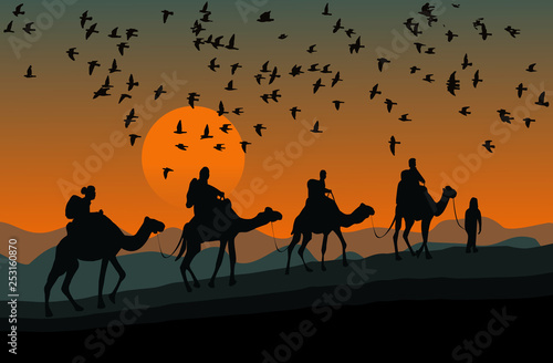 silhouette of four camel riders. Up hill with sunset  and  flock of bird background