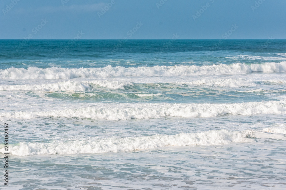 big ocean waves in windsy weather