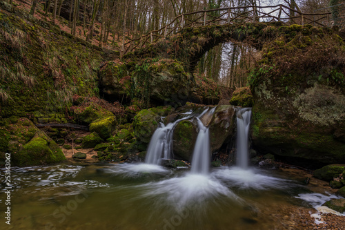 The Schiessentümpel is a small and picturesque waterfall on the Black Ernz river. Mullerthal - Luxembourg’s Little Switzerland.