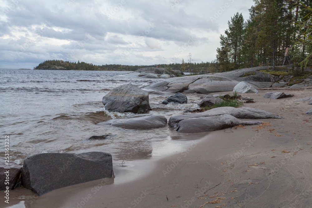 Windy spring day on the shore of Lake Ladoga. Windy spring day on the shore of Lake Ladoga.