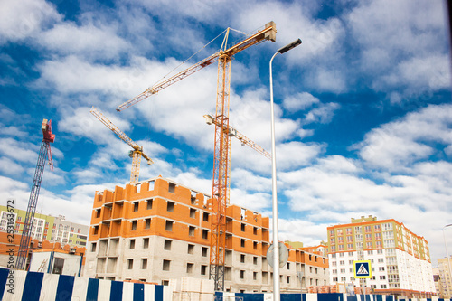 construction.high-rise cranes on construction of houses