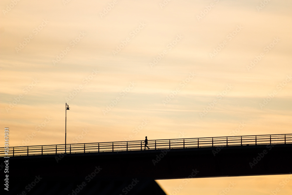 man on bridge silhouette