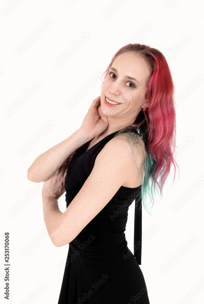 Young woman standing in a black dress waist up Young woman standing in a black dress waist up
