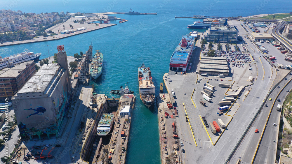 Aerial drone top view photo of industrial shipyard located in mediterranean port