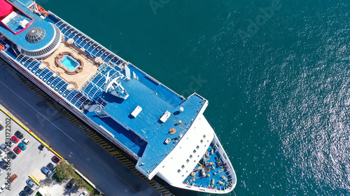 Aerial drone top view photo of passenger cruise ship docked in Mediterranean port