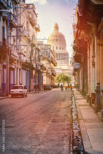 Street scene in Havana with old buildings and the Capitol