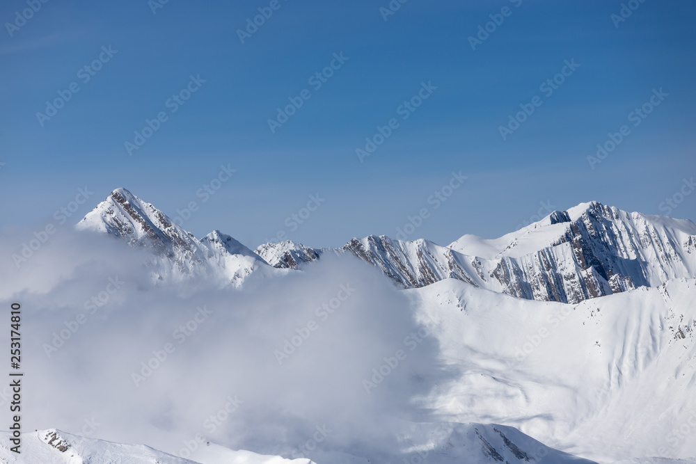 Winter snow covered mountain region Gudauri Caucasus mountains.