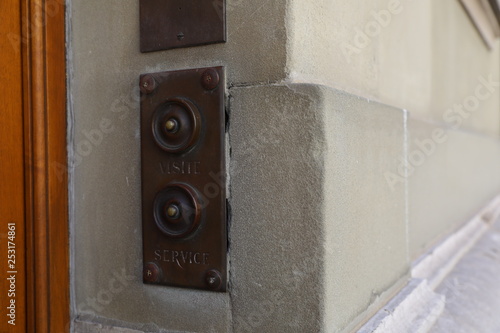 Vintage doorbell on a house in geneva