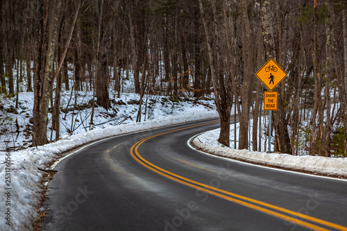 Wallpaper Mural Acton, United States, February 27, 2019. Forest road with double yellow line in winter time, Massachusetts, United States Torontodigital.ca