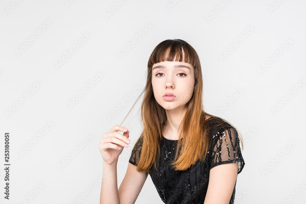 young beautiful girl model posing portraits on a white background in the studio young beautiful girl model posing portraits on a white background in the studio
