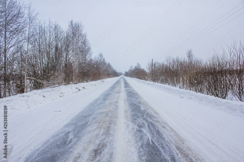 Snowy winter road. The road is covered up. Russian dear. Winter fairy tale Snowy winter road. The road is covered up. Russian dear. Winter fairy tale