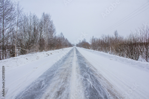 Snowy winter road. The road is covered up. Russian dear. Winter fairy tale