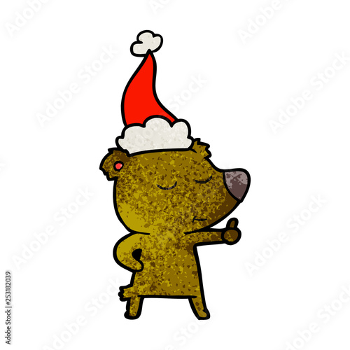 happy textured cartoon of a bear giving thumbs up wearing santa hat