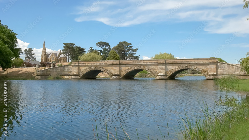 wide view of the historic sandstone bridge at ross in tasmania, australia