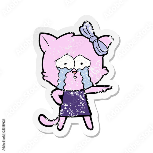 distressed sticker of a cartoon cat