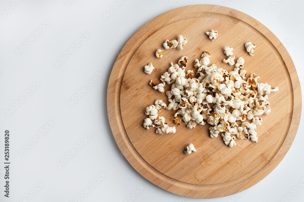 Popcorn in bowl on white background Popcorn in bowl on white background