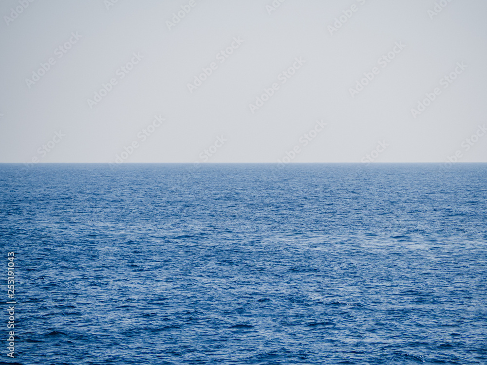 Deep blue moody sea - nothing on the horizon
