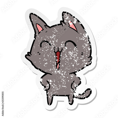 distressed sticker of a happy cartoon cat meowing
