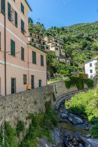 Italy, Cinque Terre, Vernazza, a castle on the side of a building © SkandaRamana