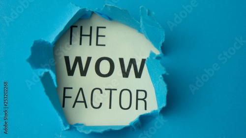 Quadro su tela Torn paper with text The wow factor. Motivational concept