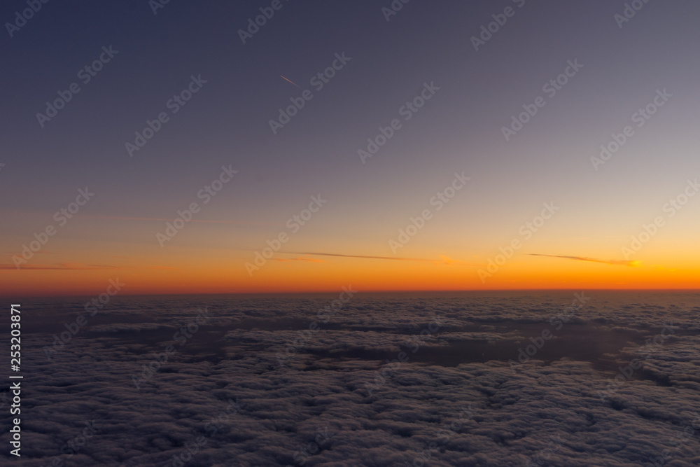 Netherlands, a sunset over a body of clouds