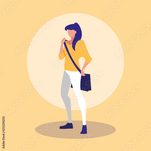 beautiful woman modeling with handbag