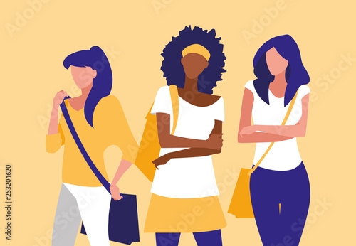 beautiful interracial girls group modeling with handbag