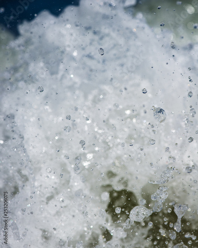 Macro waves crashing water drop © Tommy