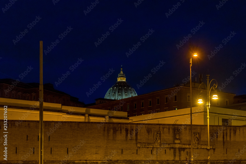 Vatican City,Italy - 23 June 2018: Lights are lit outside the walls of the Vatican in Vatican city